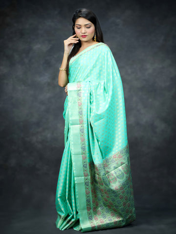 Bhawna Verma In Aquamarine Banarsi Silk Saree With Matching Pallu. Available in 2 colours.
