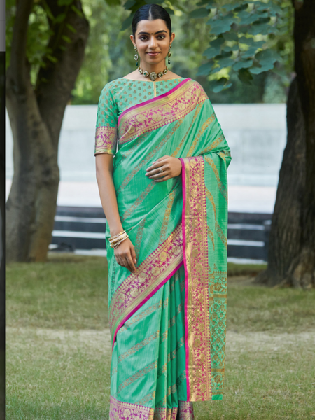 Shiksha Raghuvanshi In Grey Banarsi Silk Designer Saree. Available in 6 colours.